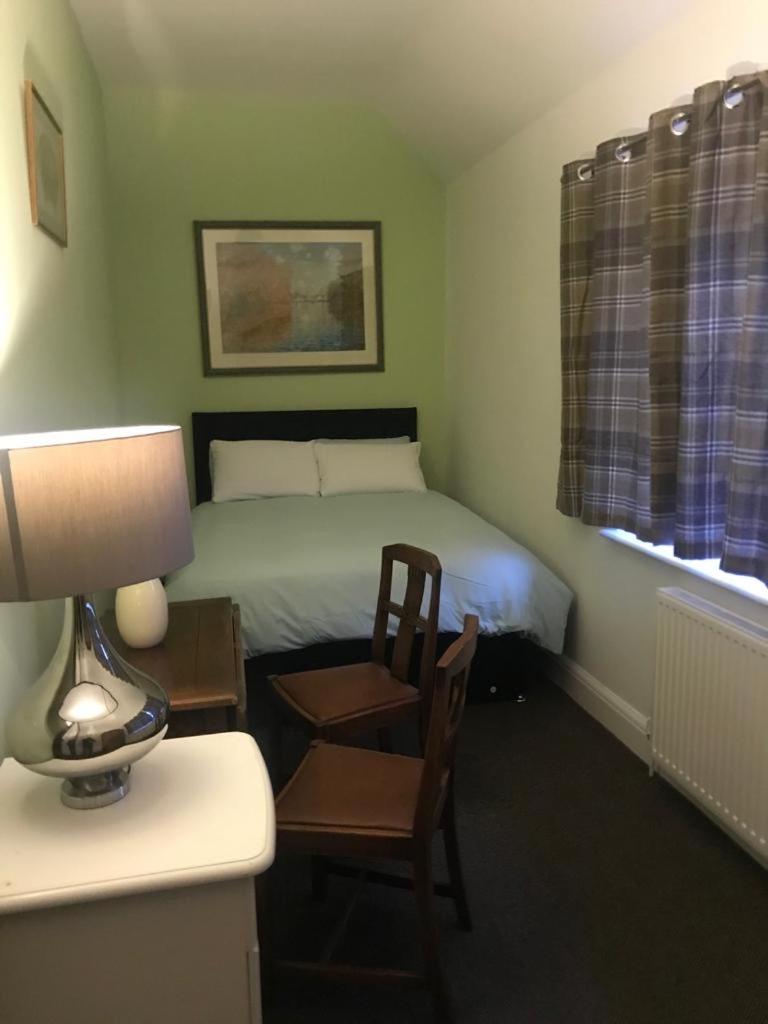 Basic Double Room with Shared Bathroom